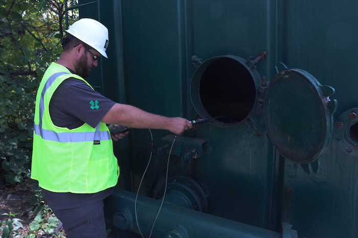 Photo of someone testing for a confined space job